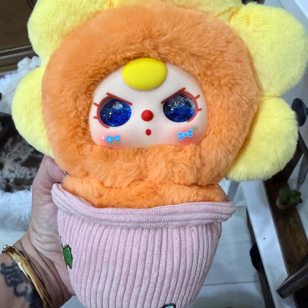 Plush Doll with Orange and Yellow Features
